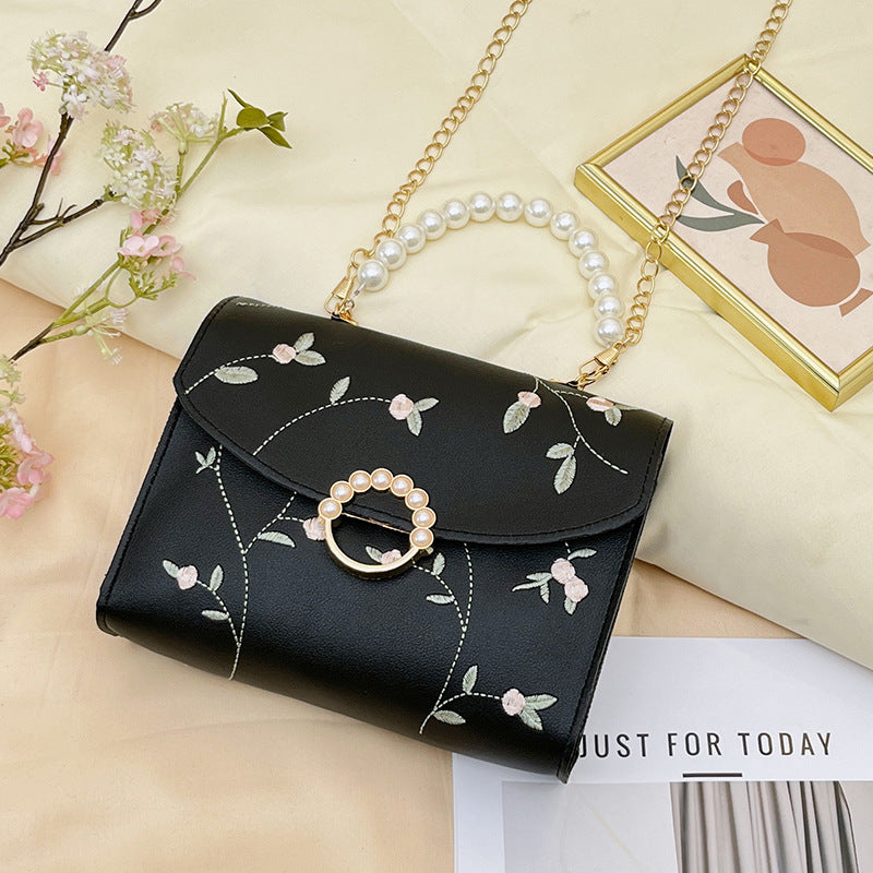 Wholesale bag with embroidered pearls and magnetic buckle chain